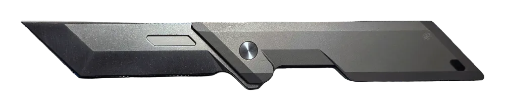 A modern utility knife blade with a dark gray textured handle and a silver metal pivot screw, shown against a plain white background.