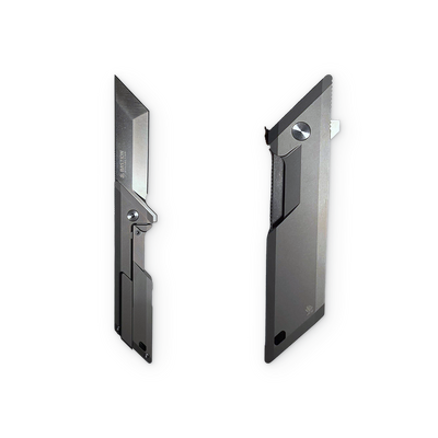 Two slim black utility knives shown side by side on a plain white background, displaying both the open blade view and the closed back view.