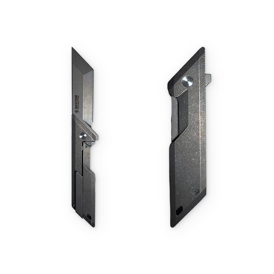 Two black replacement utility knife blades shown side by side on a plain white background.