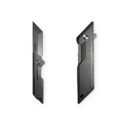 Two black replacement utility knife blades shown side by side on a plain white background.