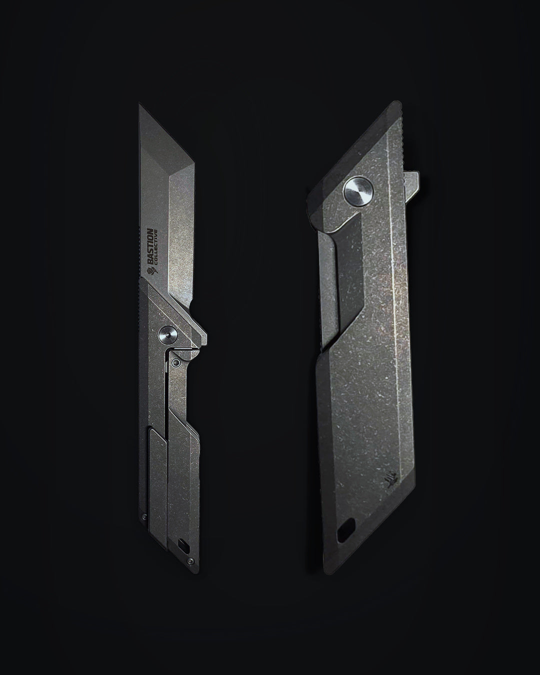 Two views of a dark gray tactical utility knife blade set against a solid black background, showing both the open blade profile and the closed handle profile.